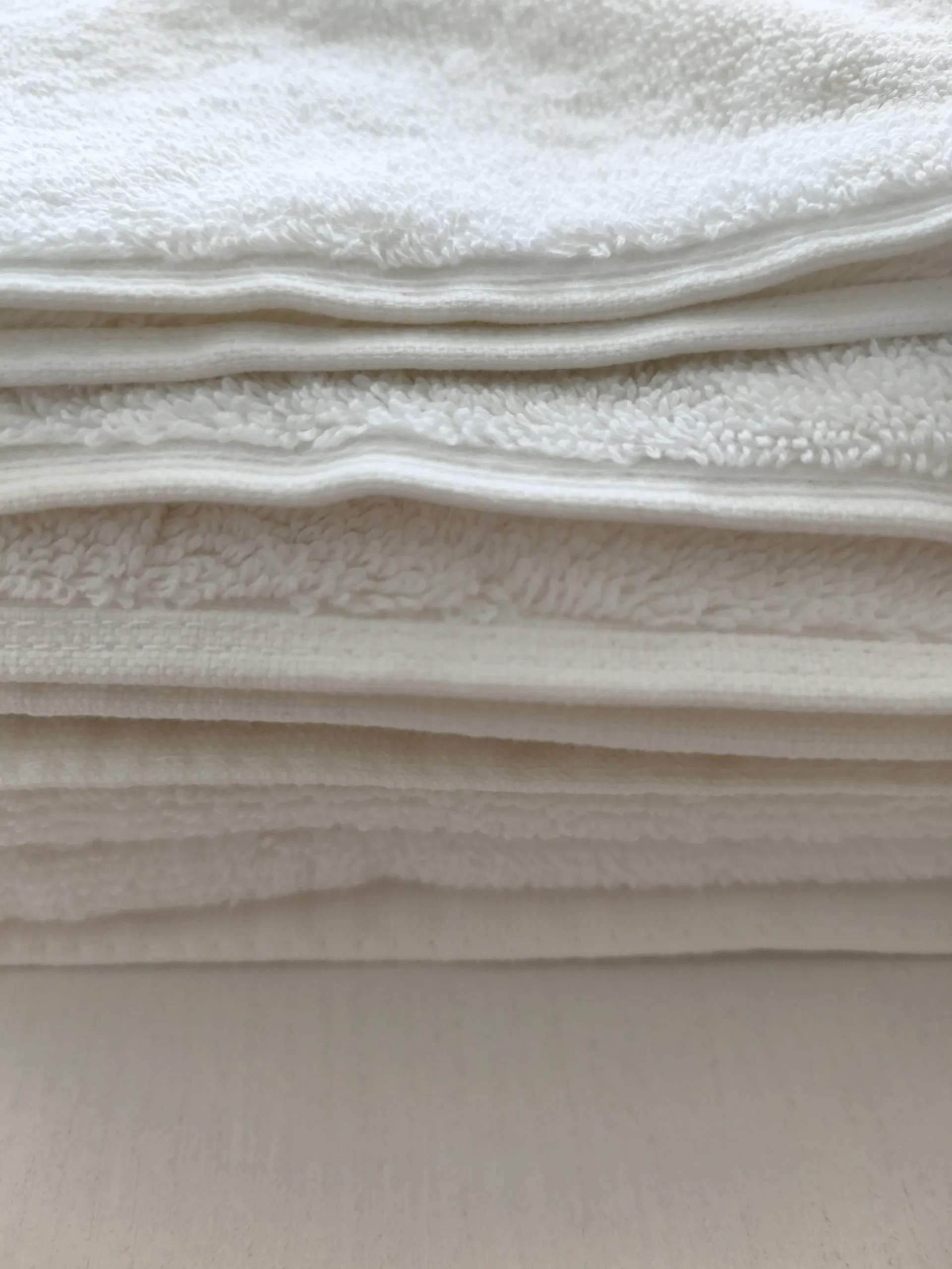 How Private Label Turkish Towel Manufacturing Works Hotel towel construction detail showing terry texture and edge finishing
