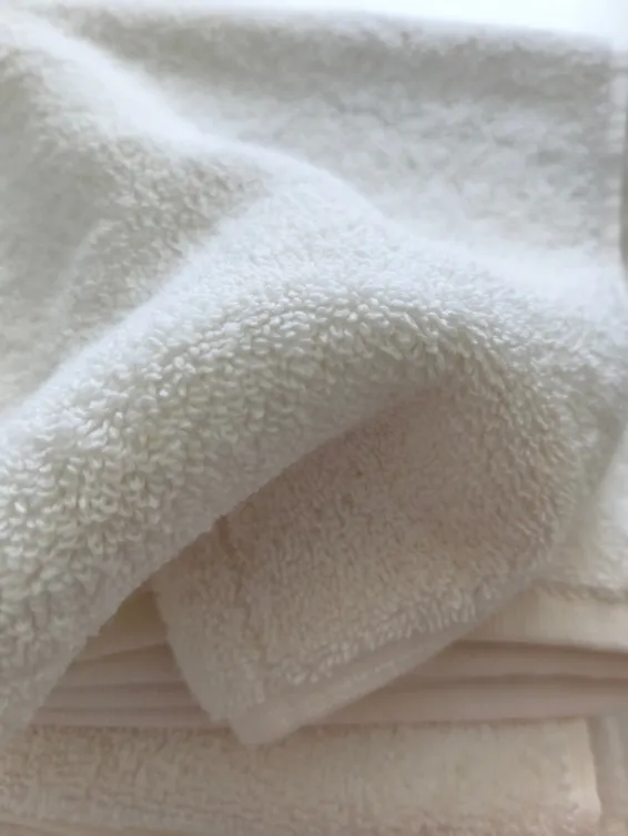 Premium white cotton towel close-up for private label towel supply