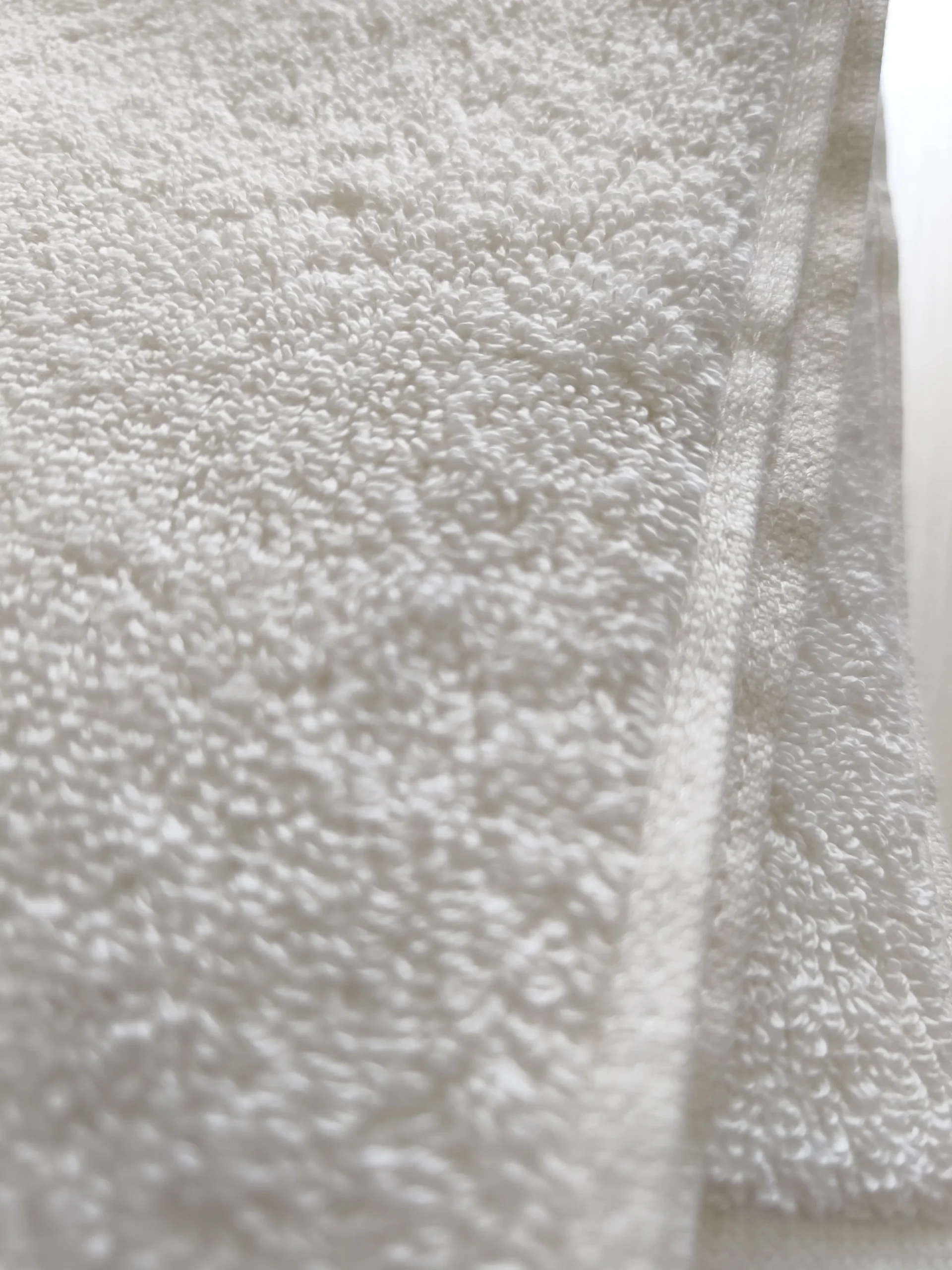 Soft terry towel surface showing textile quality and pile structure